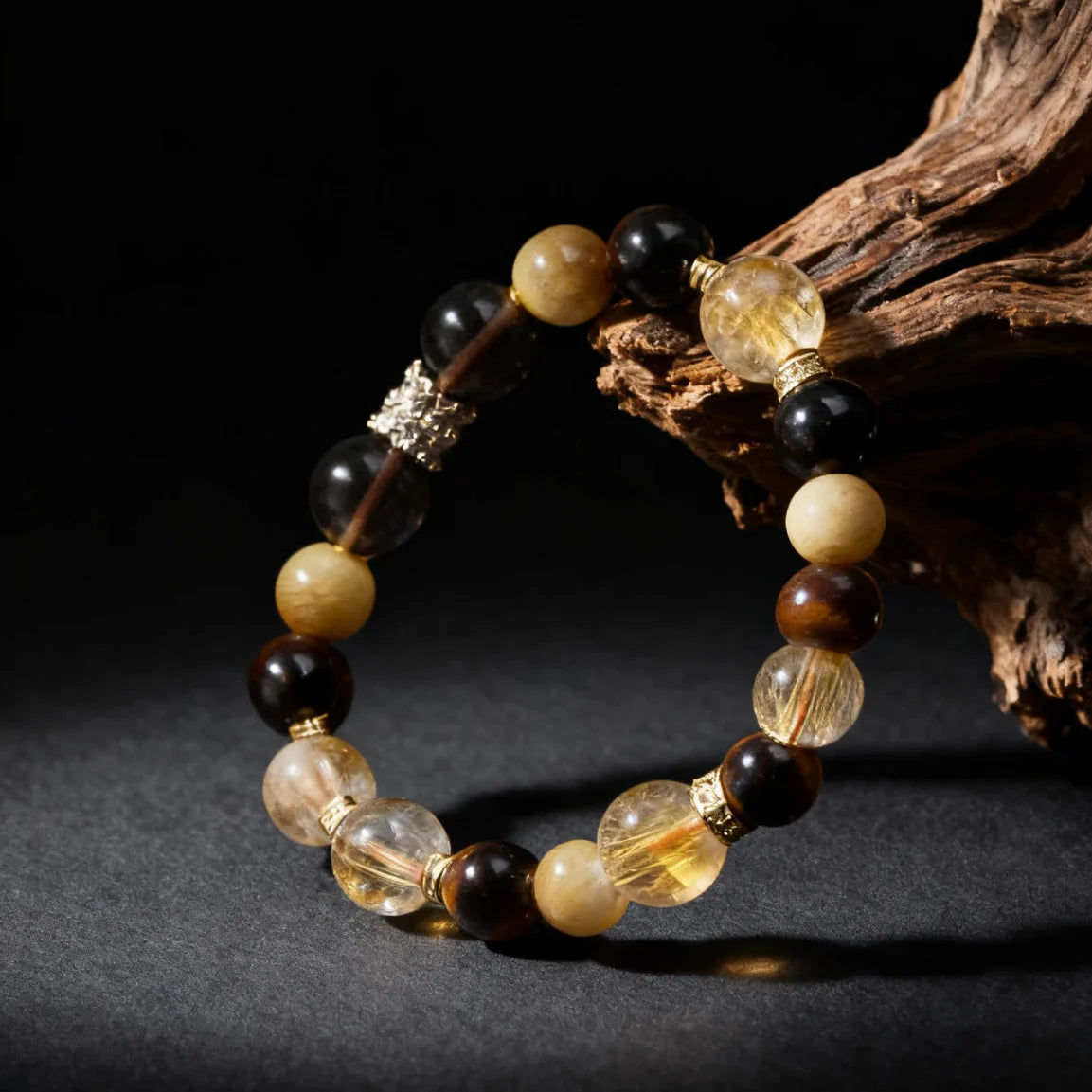 Beaded bracelet with black, yellow, and brown beads on a dark background