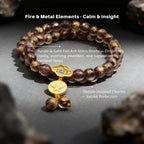 Bracelet with purple and gold foil ash-glass beads and temple-inspired charms on a dark background