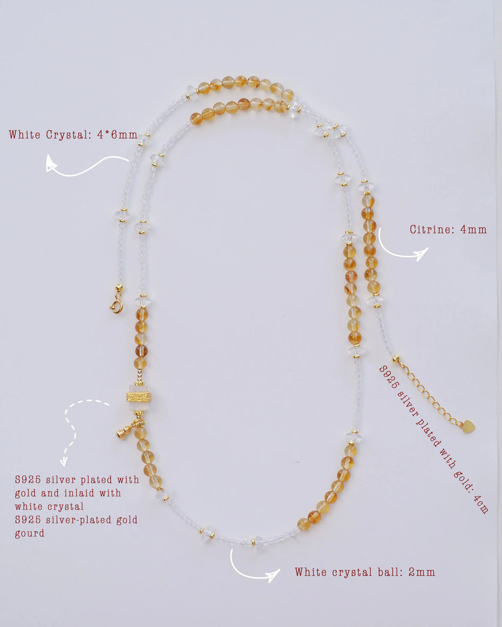 Citrine pyramid crystal bracelet paired with a clear quartz bracelet for layering.