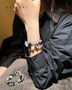 Double-row moonstone and obsidian bracelet for protection, calm, energy balance, and Aetherj