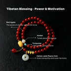 Tibetan blessing bracelet with colored beads and peace coin on a dark background