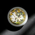 Frosted_White Decorative incense holder with floral design on a dark background